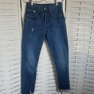 501 Levis Fly Button Blue Women's. Jeans distress size 24